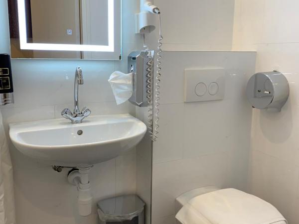 Orange Tulip Hotel : photo 3 de la chambre chambre simple avec salle de bains privative