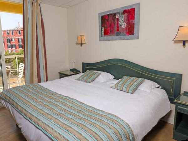 Hotel Saint Christophe : photo 7 de la chambre chambre double standard - vue sur jardin