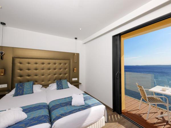 Hotel Saint Christophe : photo 9 de la chambre chambre lits jumeaux supérieure - vue sur mer