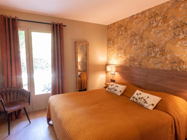 Hôtel l'Amandière : photo 1 de la chambre chambre triple 