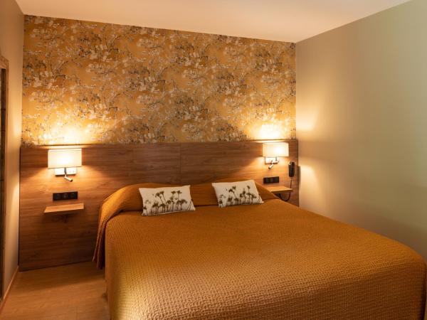 Hôtel l'Amandière : photo 3 de la chambre chambre triple 