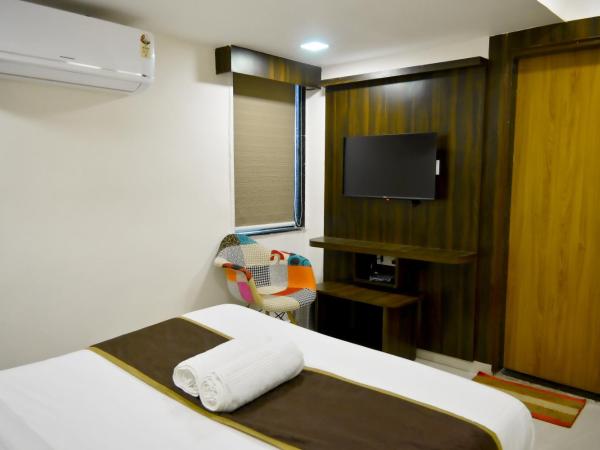 Hotel Royal Ican Sindhu Bhavan Road : photo 9 de la chambre chambre double deluxe