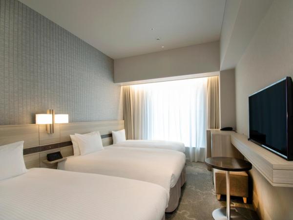 Hotel Keihan Tsukiji Ginza Grande : photo 2 de la chambre chambre lits jumeaux standard avec lit d'appoint - fumeurs