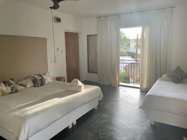 Sous le Badamier Cosy Guest House : photo 5 de la chambre chambre triple supérieure