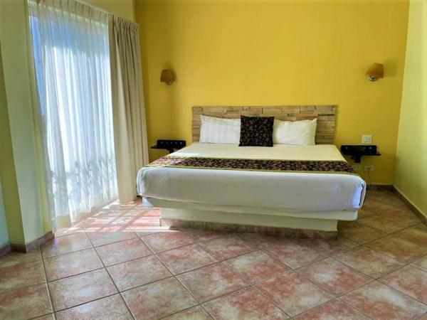 Seven Crown Express & Suites by Kavia : photo 2 de la chambre chambre lit king-size supérieure