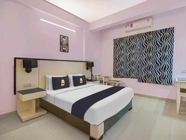 Church's Inn Near Cubbon Park : photo 1 de la chambre chambre triple classique