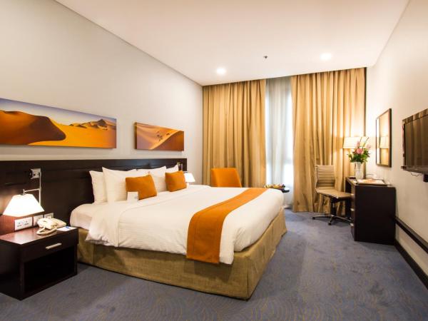 City Seasons Hotel & Suites Muscat : photo 2 de la chambre chambre supérieure