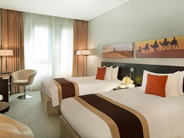 City Seasons Hotel & Suites Muscat : photo 2 de la chambre chambre familiale