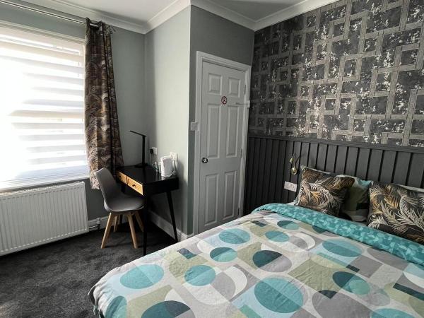 Charlotte Guest House : photo 3 de la chambre chambre double avec salle de bains commune