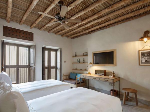Al Seef Heritage Hotel Dubai, Curio Collection by Hilton : photo 3 de la chambre chambre lits jumeaux heritage