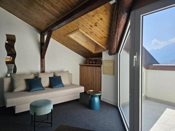 @ Home Hotel Locarno : photo 2 de la chambre suite familiale sur le toit avec balcon