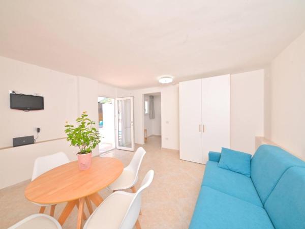 Villa Aida : photo 3 de la chambre appartement - vue sur jardin