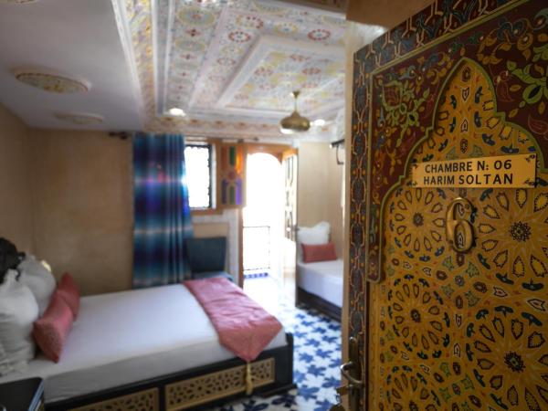 Hotel & Ryad DALILA : photo 3 de la chambre chambre double deluxe (2 adultes + 1 enfant)