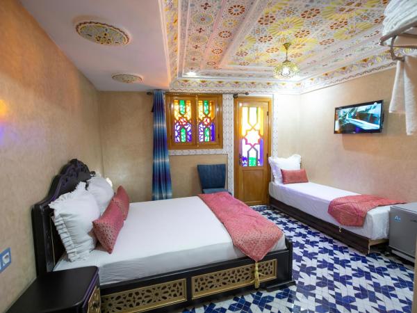 Hotel & Ryad DALILA : photo 2 de la chambre chambre double deluxe (2 adultes + 1 enfant)