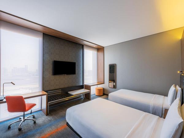 Aloft Me'aisam, Dubai : photo 1 de la chambre chambre aloft - lits jumeaux (navette gratuite vers la station de métro sobha realty, la plage jbr beach et le centre commercial mall of the emirates)