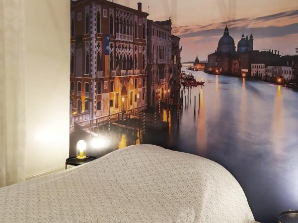 L'Echappée Belle : photo 6 de la chambre chambre familiale avec salle de bains privative