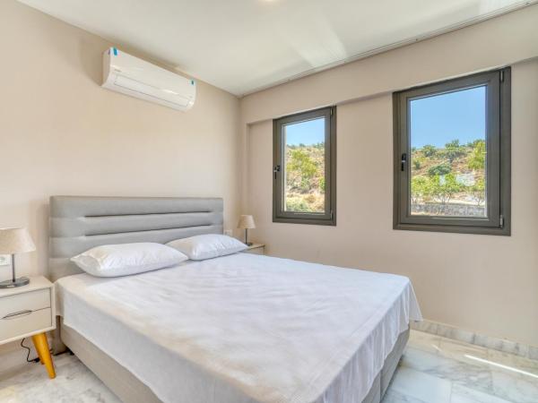 Olira Türkbükü Residences : photo 1 de la chambre appartement - vue sur jardin