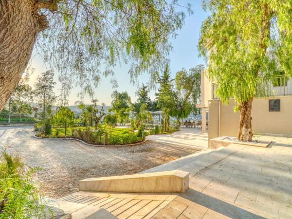 Olira Türkbükü Residences : photo 3 de la chambre appartement - vue sur jardin