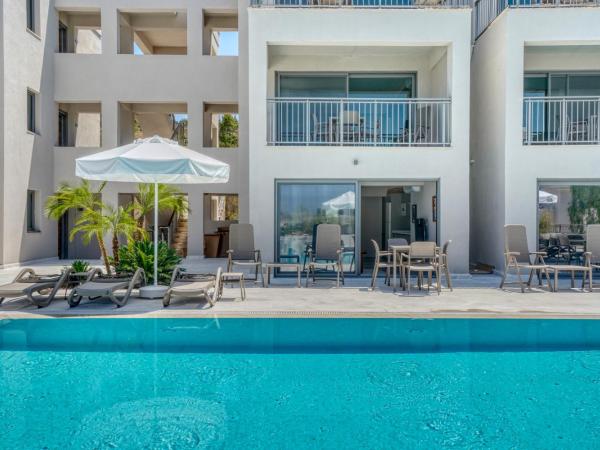 Olira Türkbükü Residences : photo 3 de la chambre appartement - vue sur piscine 