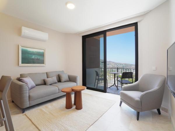 Olira Türkbükü Residences : photo 1 de la chambre appartement - vue sur jardin