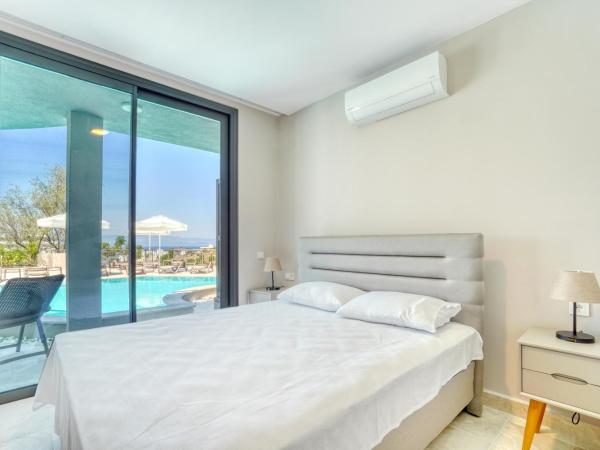 Olira Türkbükü Residences : photo 5 de la chambre appartement - vue sur piscine 