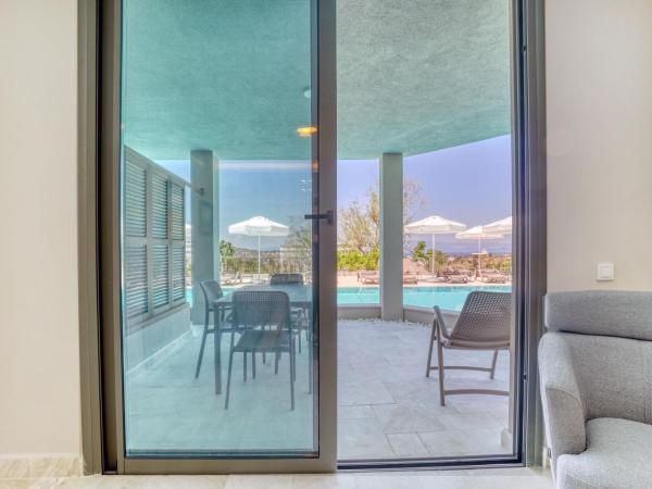 Olira Türkbükü Residences : photo 9 de la chambre appartement - vue sur piscine 