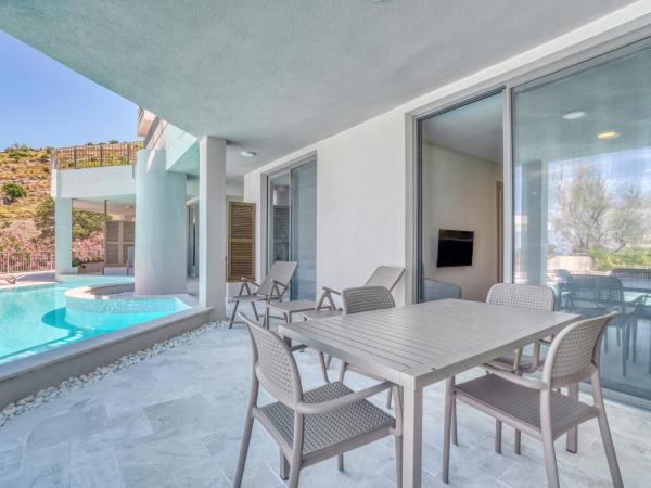 Olira Türkbükü Residences : photo 10 de la chambre appartement - vue sur piscine 