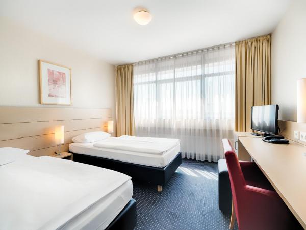Enjoy Hotel am Studio : photo 2 de la chambre chambre double ou lits jumeaux