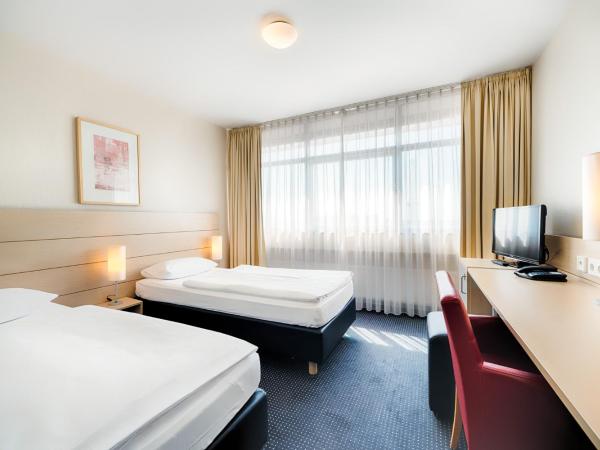 Enjoy Hotel am Studio : photo 1 de la chambre chambre double ou lits jumeaux