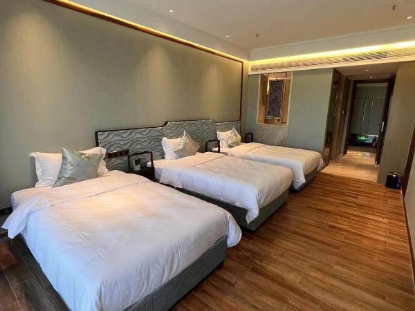 Zhongzhou International Apartment : photo 1 de la chambre chambre triple