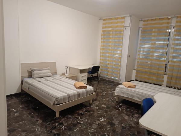 Affittacamere Pratello 97 : photo 2 de la chambre chambre lits jumeaux