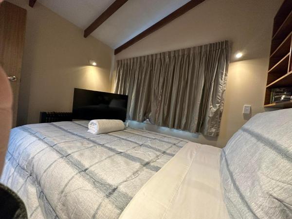 The Airport Homestay House : photo 3 de la chambre chambre simple avec toilettes et douche communes