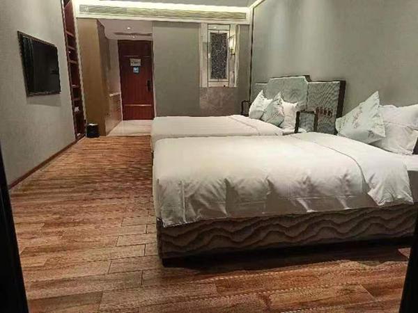 Zhongzhou International Apartment : photo 9 de la chambre chambre familiale - vue sur mer