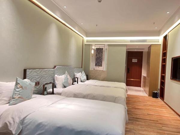 Zhongzhou International Apartment : photo 9 de la chambre chambre triple