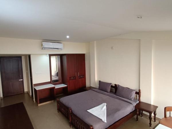 Baywatch Beach Homes : photo 2 de la chambre chambre double deluxe - vue latérale sur mer