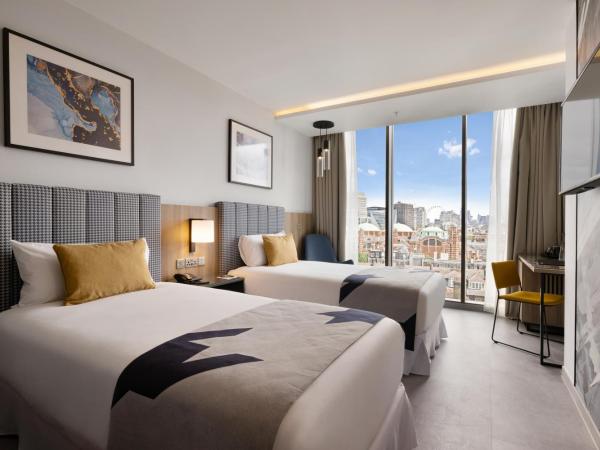 Riu Plaza London Victoria : photo 1 de la chambre chambre lits jumeaux de luxe