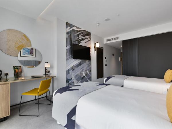 Riu Plaza London Victoria : photo 6 de la chambre chambre lits jumeaux de luxe 
