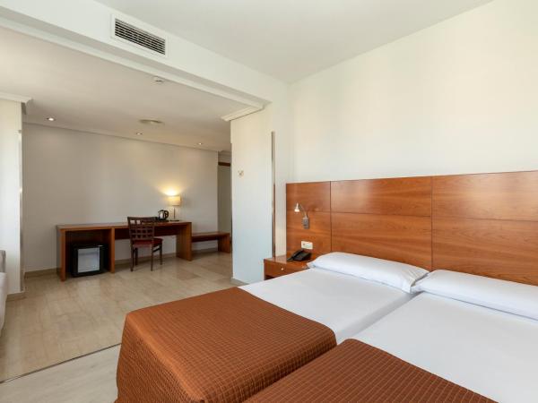 Porcel Torre Garden : photo 1 de la chambre chambre double ou lits jumeaux supérieure avec vue sur ville