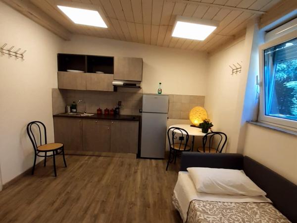 Residenza Le Dimore : photo 10 de la chambre chambre double - vue sur parc