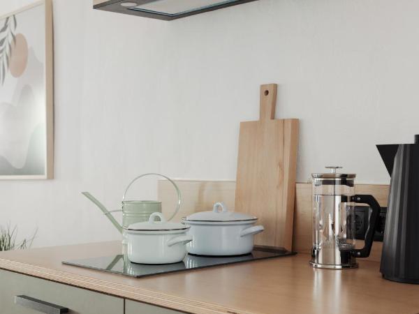 Das Grüne Haus - Boutique Apartments ecofriendly : photo 6 de la chambre appartement avec balcon