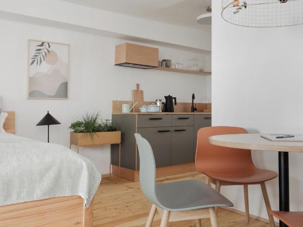 Das Grüne Haus - Boutique Apartments ecofriendly : photo 3 de la chambre appartement avec balcon