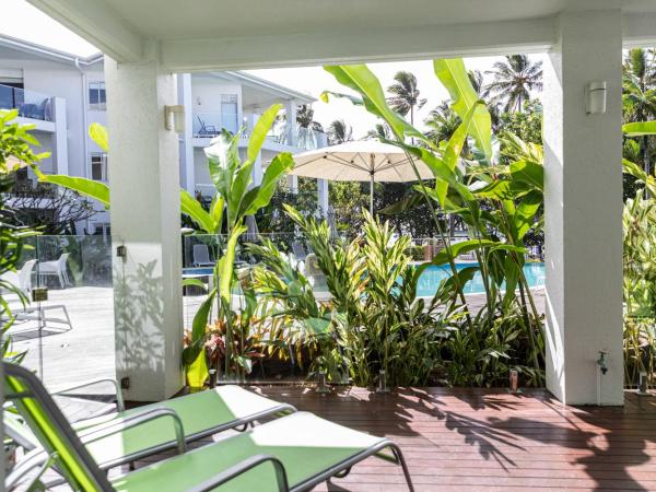 Beaches Holiday Apartments - Official Onsite Reception & Check In : photo 2 de la chambre deluxe two-bedroom apartment with pool deck access