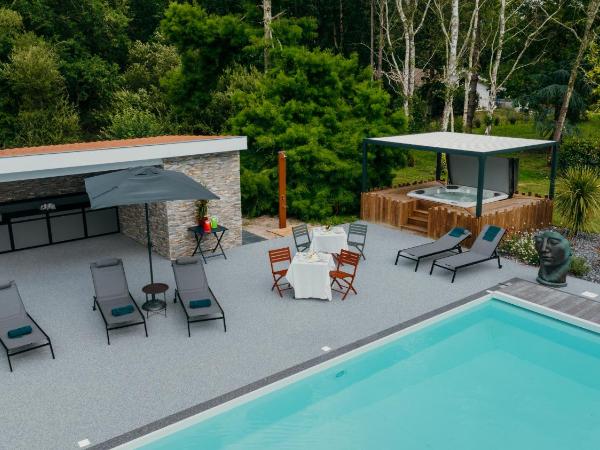 LA MAISON CACHEE-BA : photo 4 de la chambre chambre deluxe