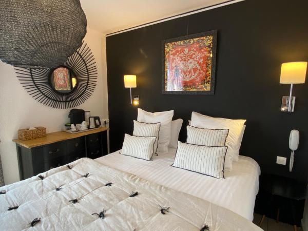 Hôtel Le Neptune en Camargue : photo 5 de la chambre chambre lit king-size