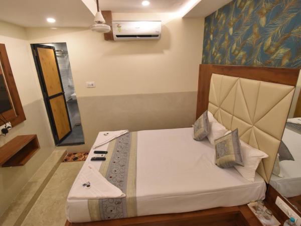 Hotel Dream Palace Residency - Near LBS Marg Kural West : photo 9 de la chambre chambre lit king-size supérieure