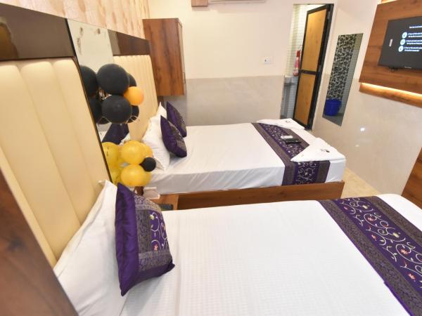 Hotel Dream Palace Residency - Near LBS Marg Kural West : photo 8 de la chambre chambre double ou lits jumeaux