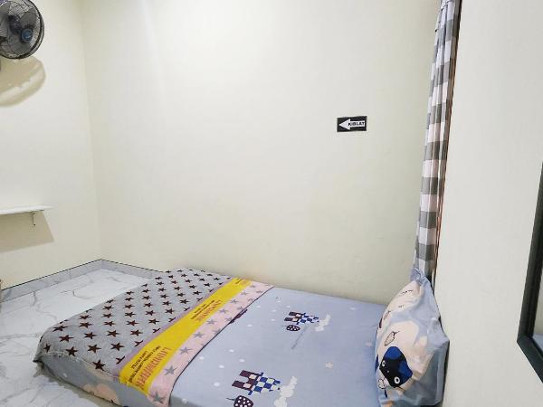 Surabaya Homey near UNAIR Syariah : photo 4 de la chambre chambre double standard avec ventilateur