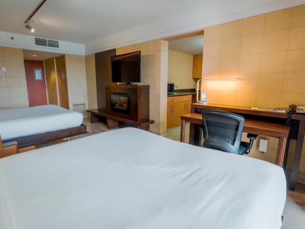 LHotelQuébec : photo 3 de la chambre chambre avec 2 lits queen-size et kitchenette