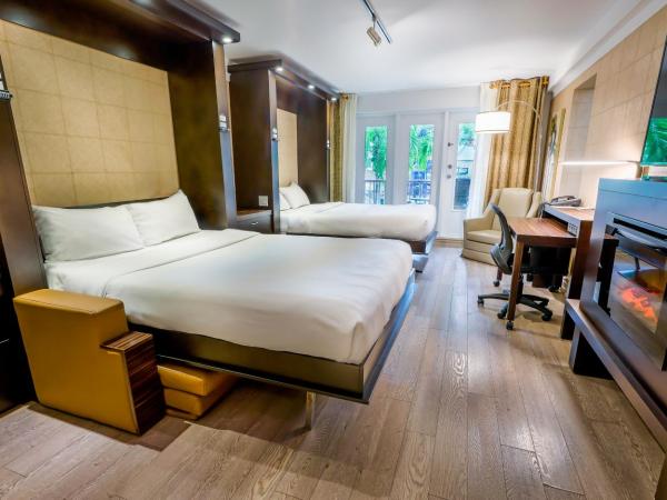 LHotelQuébec : photo 3 de la chambre chambre avec 2 lits queen-size et kitchenette - vue sur piscine