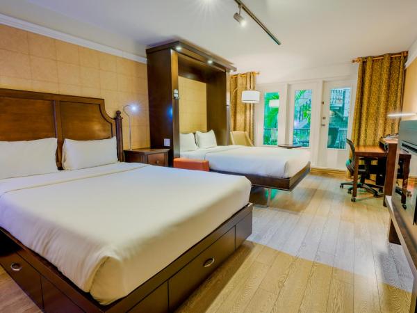 LHotelQuébec : photo 2 de la chambre chambre avec 2 lits queen-size et terrasse